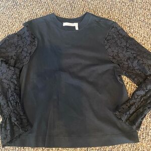 Seebychloe made in Portugal black long sleeve shirt with lace pretty sleeves.